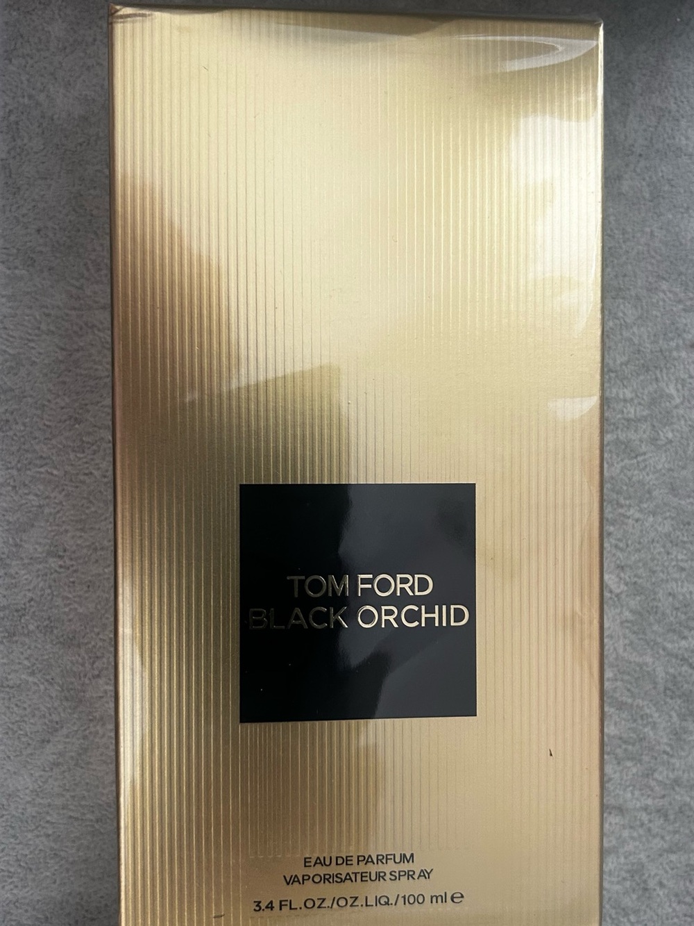 Tom Ford Gold and Black Barcoded Box